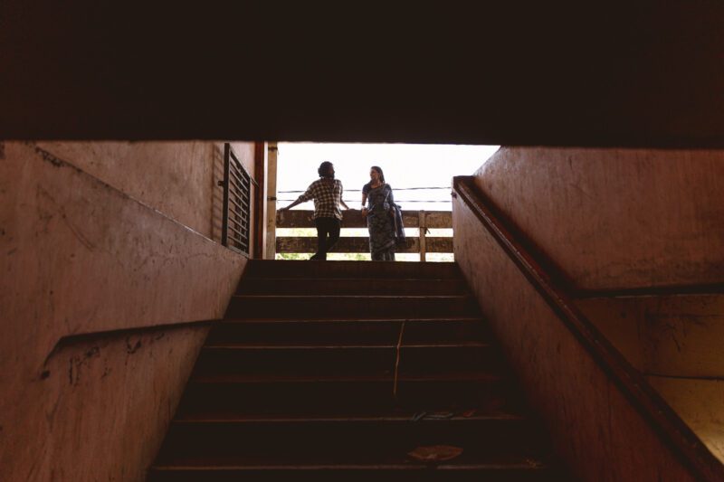 Candid shots of Kobe and Ramya exploring Tirunelveli Market, surrounded by local colors and culture. A playful moment from their Jaffna wedding story captured by Banu Photography.