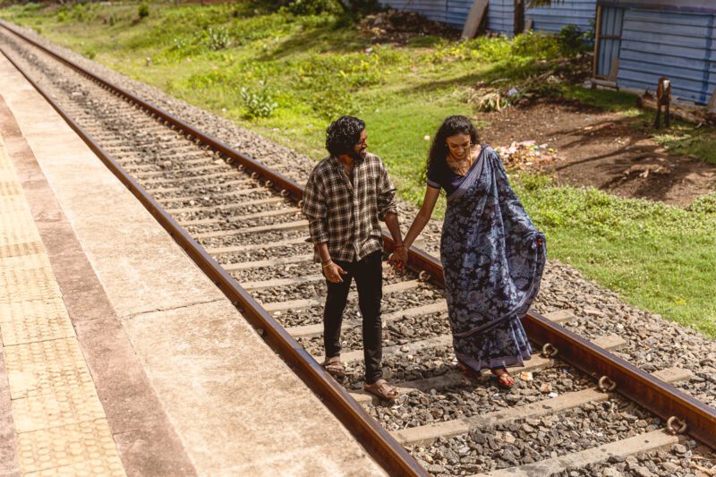 Kobe and Ramya with iconic Jaffna landmarks in the background — blending heritage and romance in their destination wedding shoot by Banu Photography.