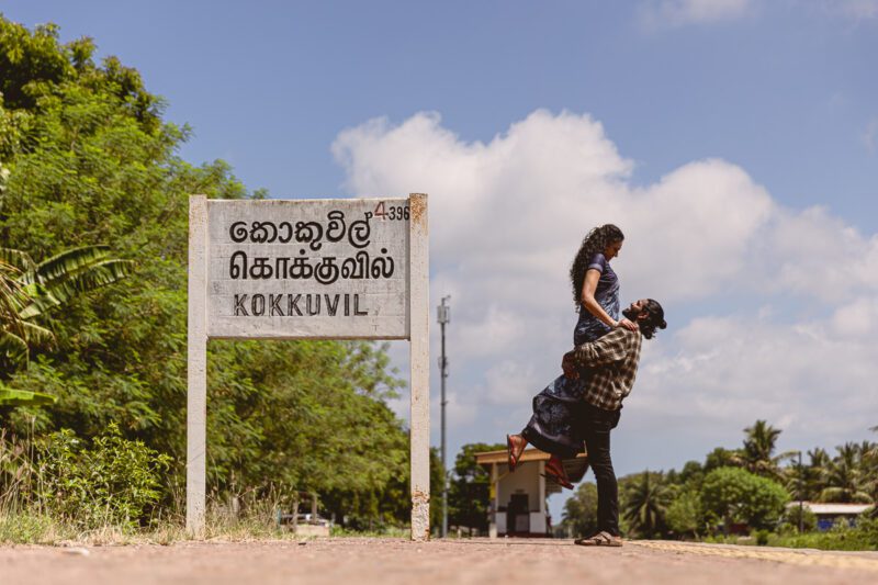 Kobe and Ramya with iconic Jaffna landmarks in the background — blending heritage and romance in their destination wedding shoot by Banu Photography.