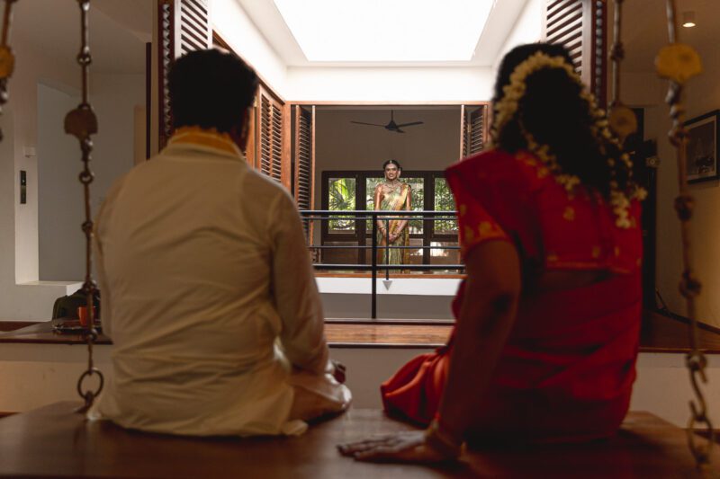 Kobe and Ramya exchanging vows at their native temple in Jaffna, surrounded by close family and friends. Traditional Tamil wedding captured by Banu Photography. Decor by Rohins Events, makeup by Vinthusha.