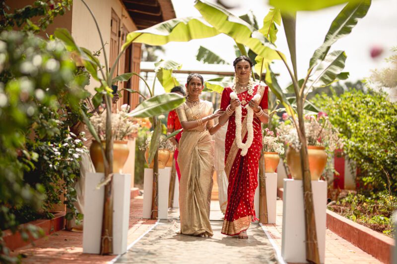 Kobe and Ramya exchanging vows at their native temple in Jaffna, surrounded by close family and friends. Traditional Tamil wedding captured by Banu Photography. Decor by Rohins Events, makeup by Vinthusha.