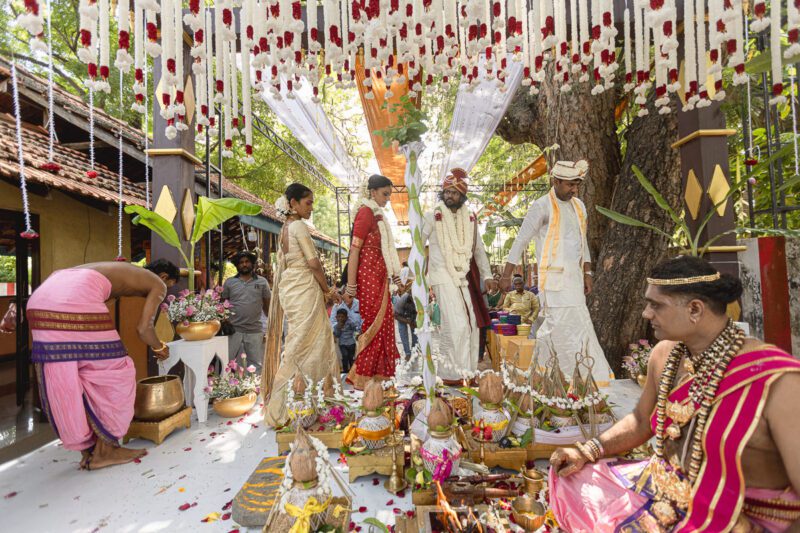 Kobe and Ramya exchanging vows at their native temple in Jaffna, surrounded by close family and friends. Traditional Tamil wedding captured by Banu Photography. Decor by Rohins Events, makeup by Vinthusha.