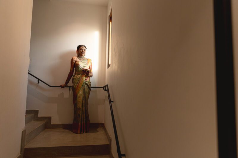 Kobe and Ramya exchanging vows at their native temple in Jaffna, surrounded by close family and friends. Traditional Tamil wedding captured by Banu Photography. Decor by Rohins Events, makeup by Vinthusha.