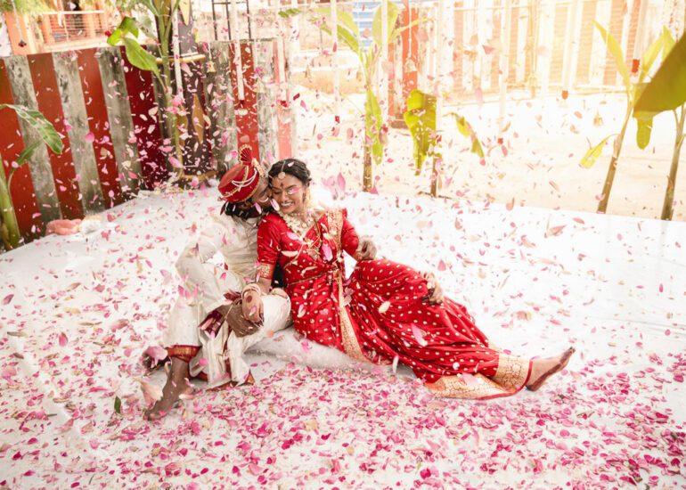 Kobe and Ramya exchanging vows at their native temple in Jaffna, surrounded by close family and friends. Traditional Tamil wedding captured by Banu Photography. Decor by Rohins Events, makeup by Vinthusha.