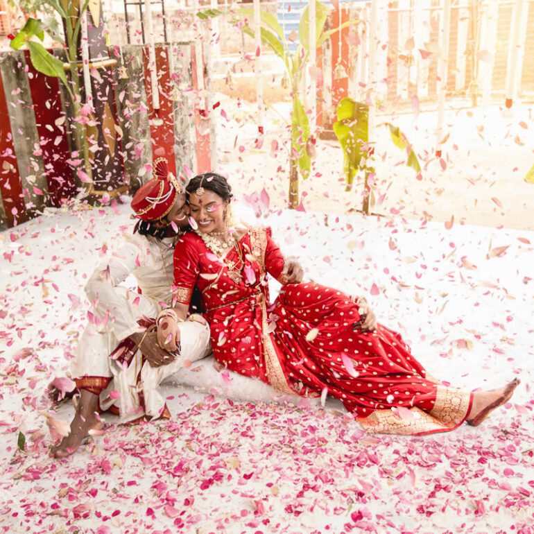 Kobe and Ramya exchanging vows at their native temple in Jaffna, surrounded by close family and friends. Traditional Tamil wedding captured by Banu Photography. Decor by Rohins Events, makeup by Vinthusha.