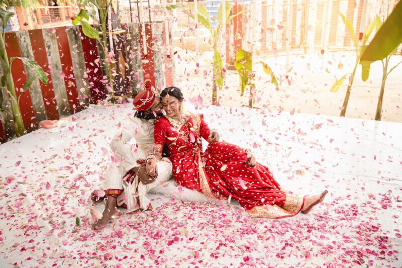 Kobe and Ramya exchanging vows at their native temple in Jaffna, surrounded by close family and friends. Traditional Tamil wedding captured by Banu Photography. Decor by Rohins Events, makeup by Vinthusha.