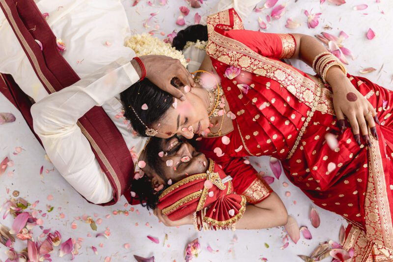 Kobe and Ramya exchanging vows at their native temple in Jaffna, surrounded by close family and friends. Traditional Tamil wedding captured by Banu Photography. Decor by Rohins Events, makeup by Vinthusha.