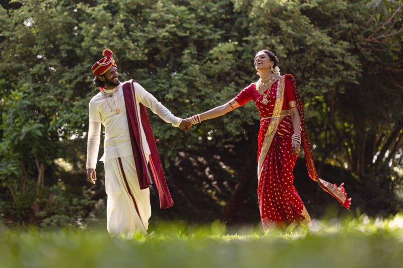 Kobe and Ramya exchanging vows at their native temple in Jaffna, surrounded by close family and friends. Traditional Tamil wedding captured by Banu Photography. Decor by Rohins Events, makeup by Vinthusha.